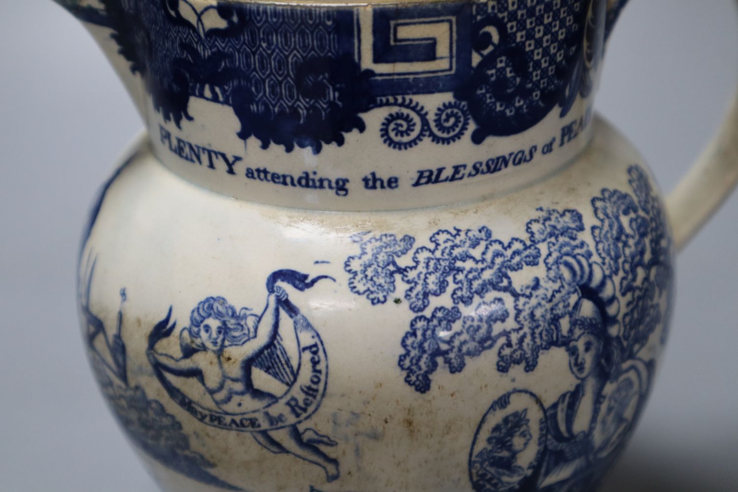 A rare pearlware jug commemorating the Peace of Amiens, c.1802, probably Swansea Pottery, 17cm